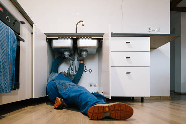 Professional Drain Cleaning technician working in Crestline, CA
